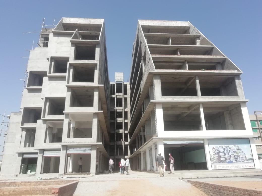 145742_const of real estate project Swarnim Business Hub located at Tragad, Ahmedabad, Gujarat