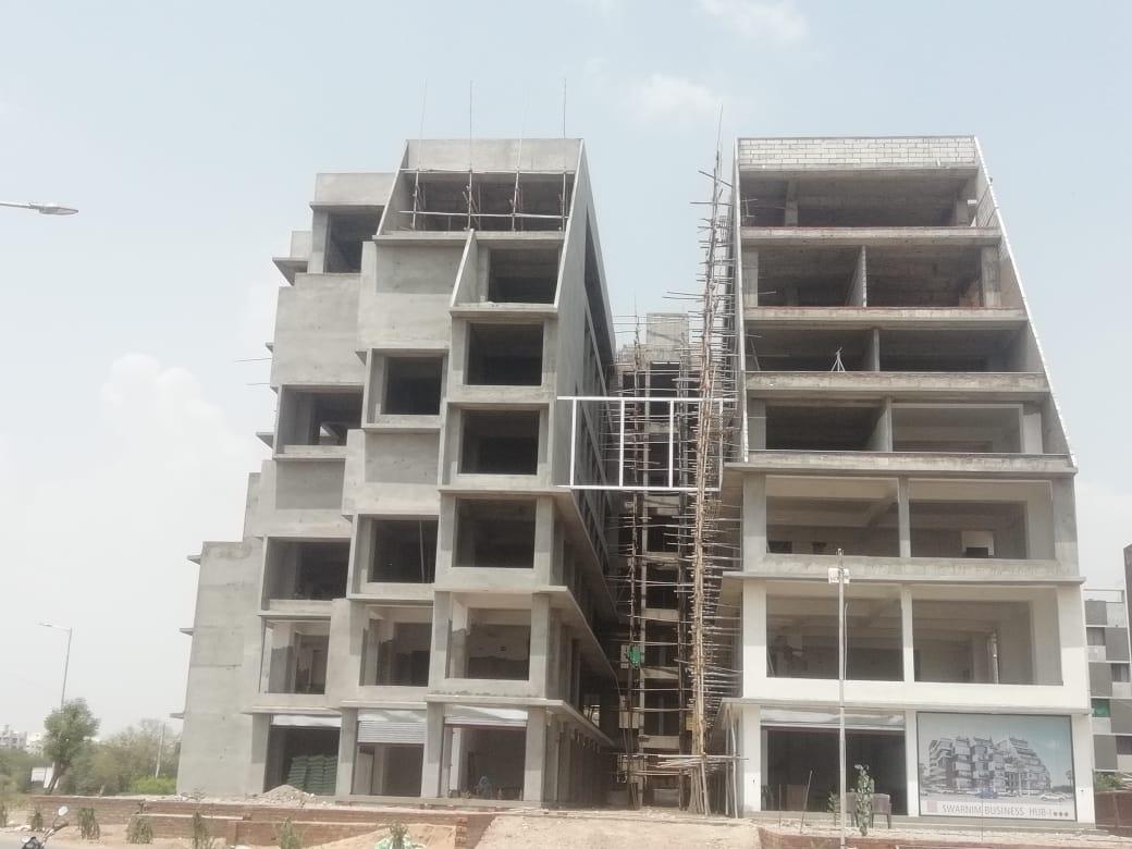 162805_const of real estate project Swarnim Business Hub located at Tragad, Ahmedabad, Gujarat