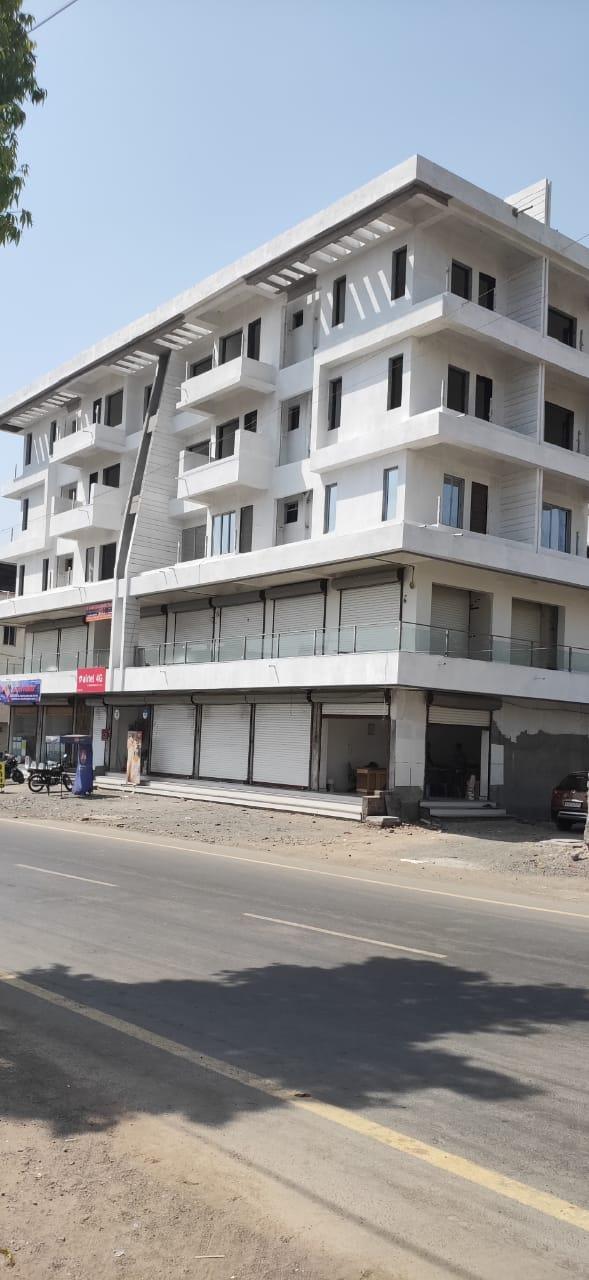 122970_const of real estate project Shivam Complex located at Desra, Navsari, Gujarat