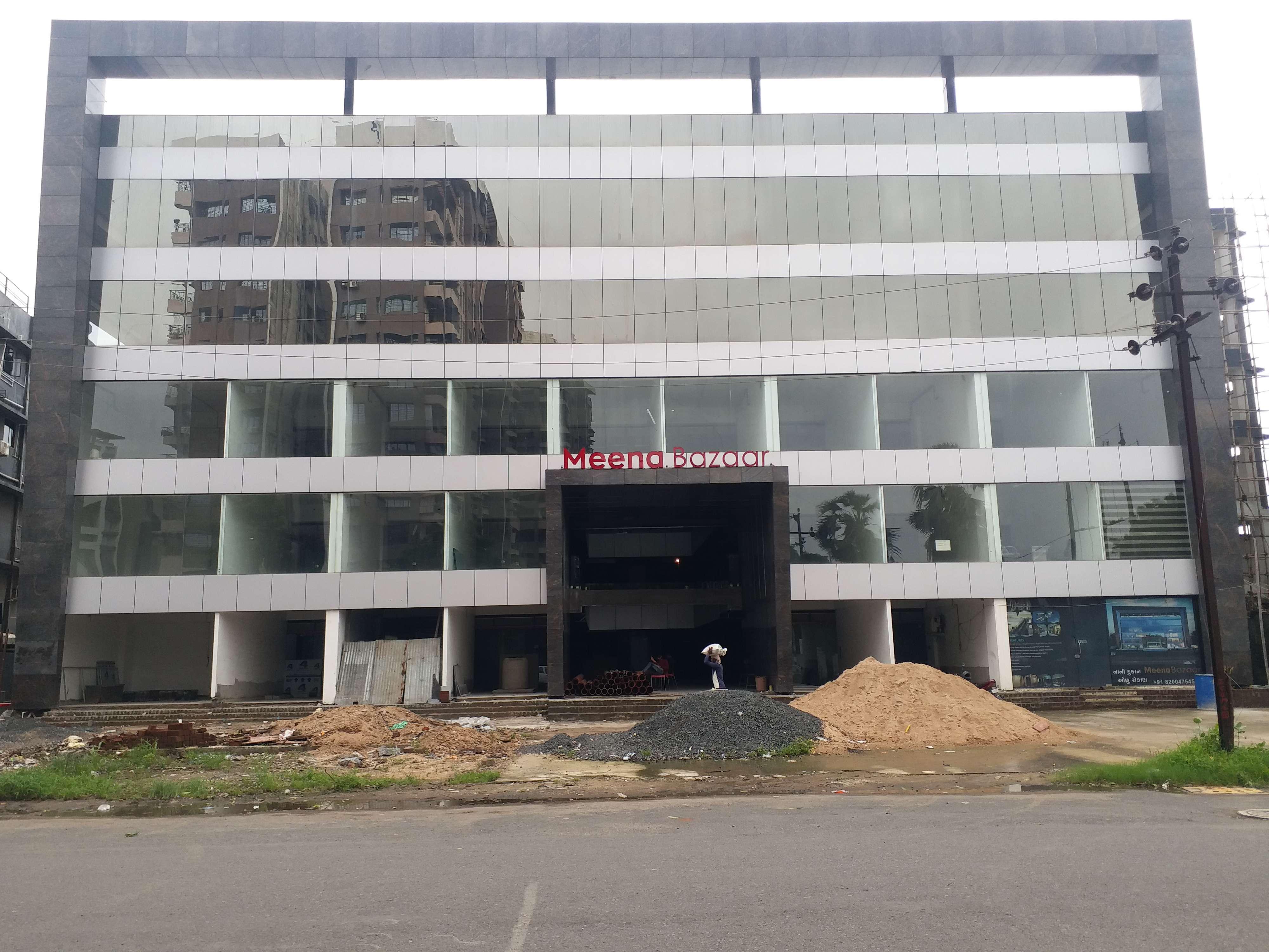 190648_const of real estate project Meena Bazaar located at Pal, Surat, Gujarat