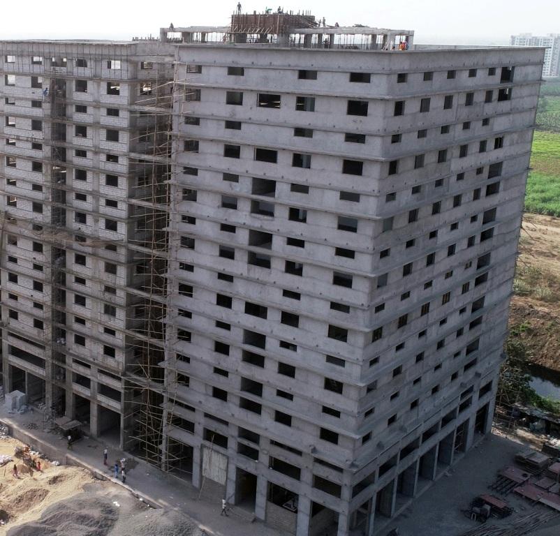 116929_const of real estate project Shree Kuberji Textile Deck located at Kumbhariya, Surat, Gujarat