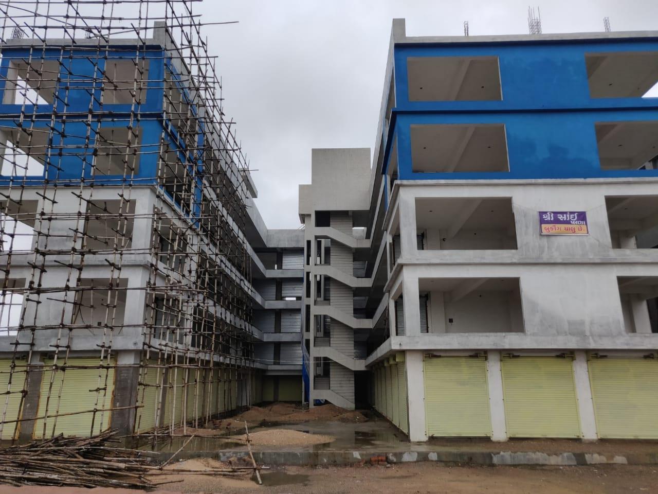 40718_const of real estate project Shree Sai Plaza located at Dindoli, Surat, Gujarat