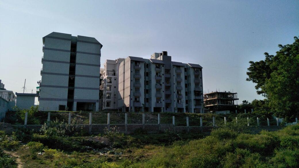 156699_const of real estate project Shyamaprasad Nagar Tower D E Fp1 located at Vemali, Vadodara, Gujarat